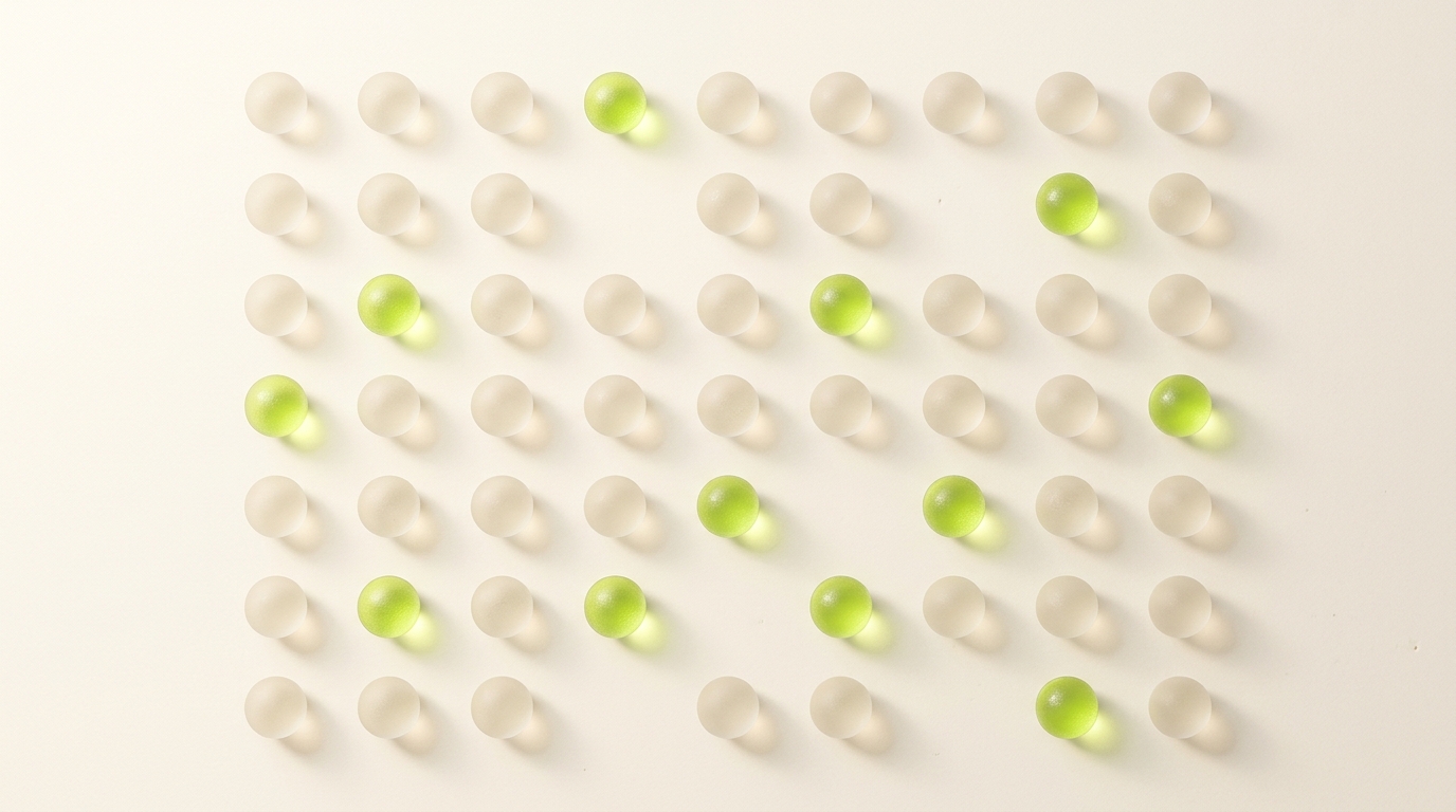 A scatter of 40 small frosted-glass brand markers across a cream surface, with 12 highlighted in lime green, representing the 12 brands that passed all Layer 1 tests